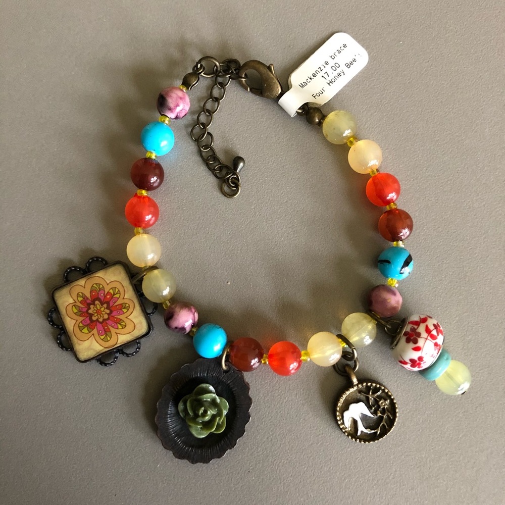 Bead bracelet with charms
